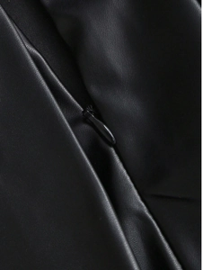 Macro view of seamless invisible zipper and high-quality PU leather texture on black skirt