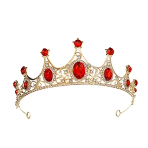 Elegant gold bridal tiara with large red rubies and white crystals for weddings