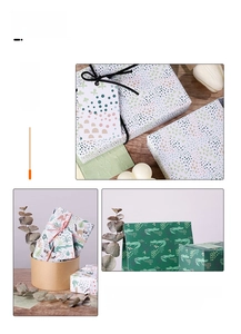 DIY jungle-themed gift wrapping paper kit with cartoon animal patterns and tags
