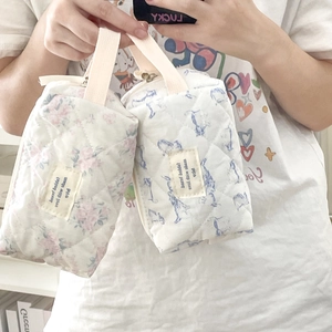 Quilted cotton floral pouch and blue bunny makeup bag with webbing handle and zipper