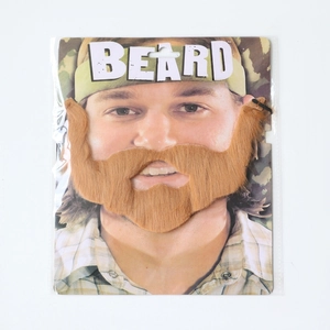 Detail of light brown beard and mustache set in transparent hanging retail packaging