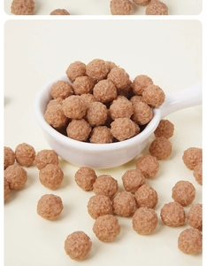 Detailed view of realistic miniature meatballs in a ceramic bowl for DIY food models