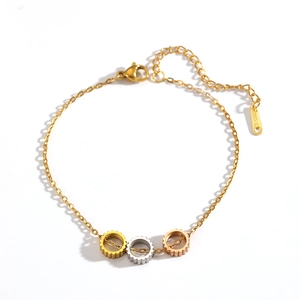 Bracciale con ciondoli a cuore a ingranaggi in tre toni oro, argento e oro rosa