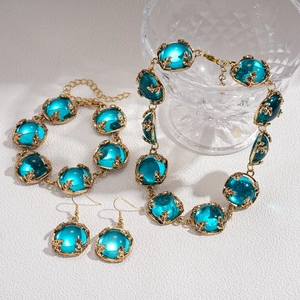 Parure rétro collier bracelet et boucles d'oreilles géométriques en résine bleu