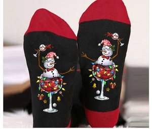 Detailed knit pattern of Christmas crew socks with snowman and wine glass festive graphics