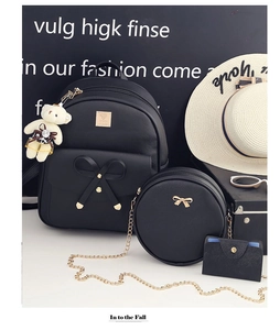 Chic black 3-piece bag set with bow detail, bear charm and travel-style accessories