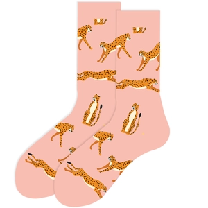 Detailed flat lay of pink mid-calf socks with all-over cheetah animal print on white background