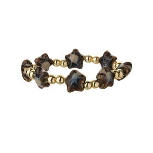 Bracelet minimaliste avec perles en cuivre doré et étoiles en céramique effet marbre