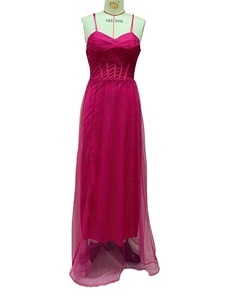 Detail of fuchsia evening dress with shimmering glitter tulle and corset bodice design