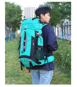 Close-up of 60L outdoor hiking backpack showing durable nylon fabric and side compression straps
