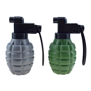 Detail view of creative grenade-shaped lighters in army green and dark grey finishes