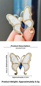 Detail showing vintage butterfly brooch size 3.5cm and 8.5g weight with pearl and crystal