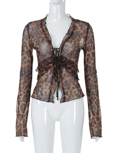 Close-up of leopard print sheer mesh cardigan with tie-front closure and ruffle details