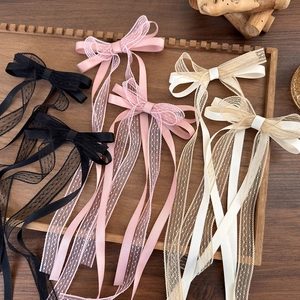 Lace bow hair clips with long tassels in black, pink and white balletcore style