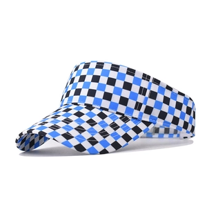 Detail view of checkerboard pattern sun visor with reinforced stitching on the brim