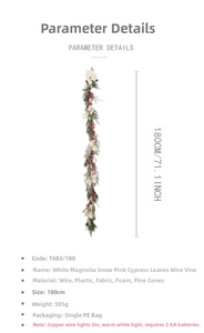 Détail de la guirlande de magnolia blanc de 180cm avec pommes de pin et fils LED