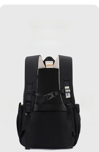 Detail of ergonomic breathable mesh back panel and adjustable chest straps on black backpack