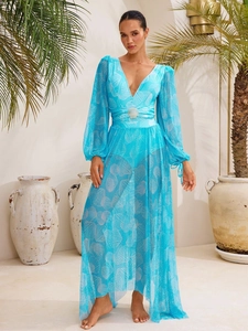 Detail of light blue V-neck swimwear with shell print and sheer mesh dress with waist decor