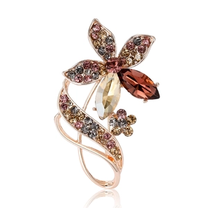 Elegant rose gold flower brooch with colorful rhinestones and crystals for formal suits