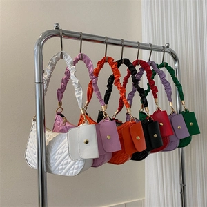 Quilted cloud bag with pleated strap and detachable coin purse in various vibrant colors