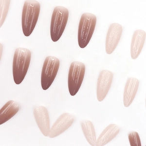 Elegant nude mocha gradient almond press-on nails with glitter and white floral art