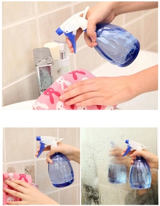 Blue spray bottle cleaning faucets and tiles in a bathroom setting for home use
