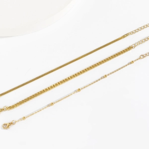 Three-layer gold snake bone and cuban link bracelet set with lobster clasp closure