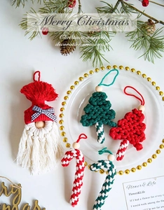 Detailed macro of handcrafted macramé Christmas ornaments with wooden beads and cotton rope