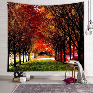 Detail of autumn forest tapestry hanging on white brick wall with home decor items