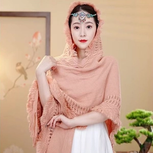 Ethnic knit hooded shawl wrap with fringe tassels and hollow pattern in dusty pink
