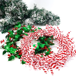 Christmas garland set with holly leaves, red berries, and candy cane ornaments for tree decor