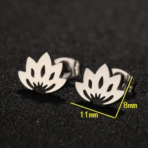 Minimalist stainless steel lotus flower stud earrings measuring 11mm by 8mm on black background