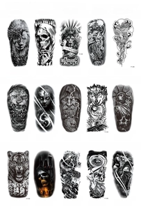 Detailed sheet showing realistic wolf, skull, and lion waterproof tattoos, 208x95mm size