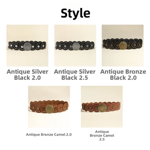 Detail of vintage Baroque PU belts featuring hollow patterns and embossed metal buckles