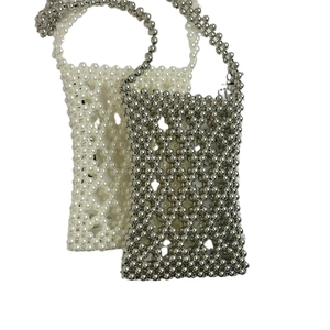 Handmade beaded lattice phone bag in pearl white and metallic silver finishes