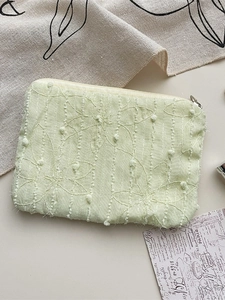 Light green chiffon floral coin purse with 3D embroidery and decorative pom-poms
