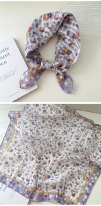 Close-up of knotted purple floral linen square scarf with yellow border and lattice pattern