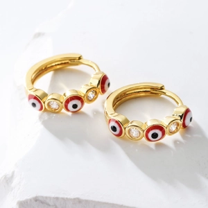 Gold plated evil eye hoop earrings with red enamel and sparkling cubic zirconia stones