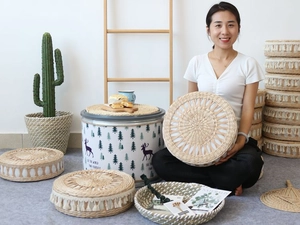 Detail of handcrafted round woven straw cushions and natural futons for home decor