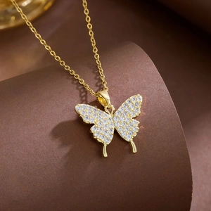 Elegant gold butterfly necklace for women with sparkling crystal pavé on dainty O-chain