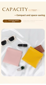 Detail of pink and yellow PU leather pouches on silk for jewelry and lipstick