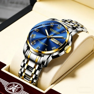 Detail view of quartz watch with blue sunray dial and gold-silver stainless steel strap