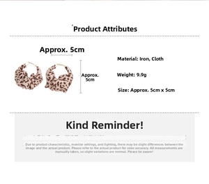 Detail view of 5cm leopard print fabric earrings showing precise dimensions and 9.9g weight