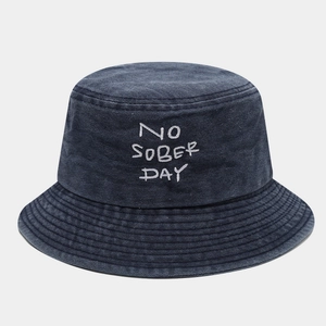 Detailed view of NO SOBER DAY embroidery on washed cotton canvas fisherman bucket hat