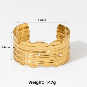 Detail view of 34mm wide gold stainless steel textured cuff bangle with dimensions