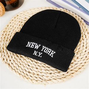 Winter warm knitted black beanie hat with New York embroidered letters for outdoor wear