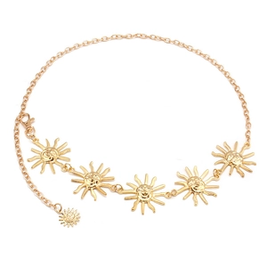 Detailed view of golden sun pendant waist chain with lobster clasp and extension links