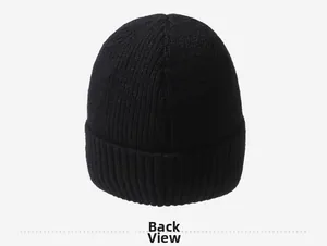 Detail showing back view of black ribbed knit beanie with thick texture and wide cuff