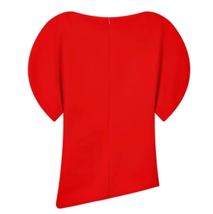 Detail view of red irregular asymmetric top with puff sleeves and invisible back zipper