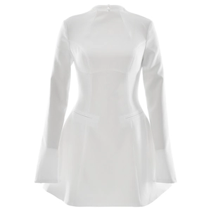 Close-up of a white long-sleeve mini dress with a structured fit and waist pocket details